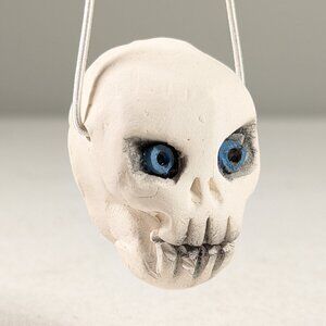 Small miniature handmade ceramic skull ornament, art pottery Halloween decor